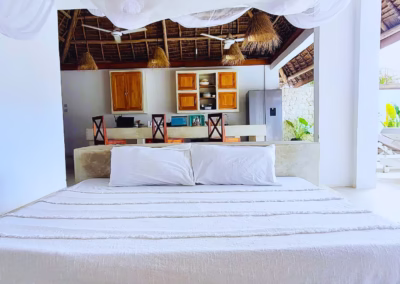 The Penthouse Villa Paje Day bed and kitchen