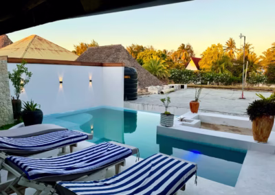 The Penthouse Villa Pool and deck chairs